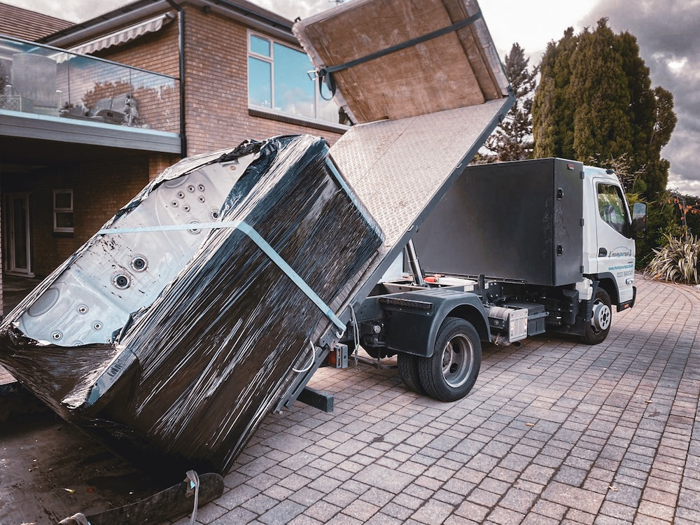 hot tub disposal on tipper vehicle